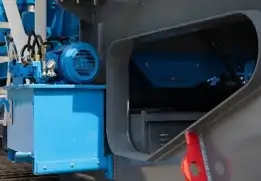 Orificio de acceso en planta trituradora de impacto eléctrica