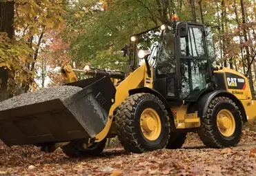 Marcas de cargadores frontales Caterpillar - potencia superior y red global de servicio técnico