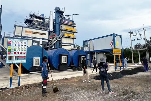 Highway Department technicians verifying asphalt mix quality