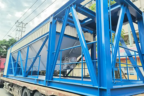 Bag filter lower bin being loaded for export at the outdoor site